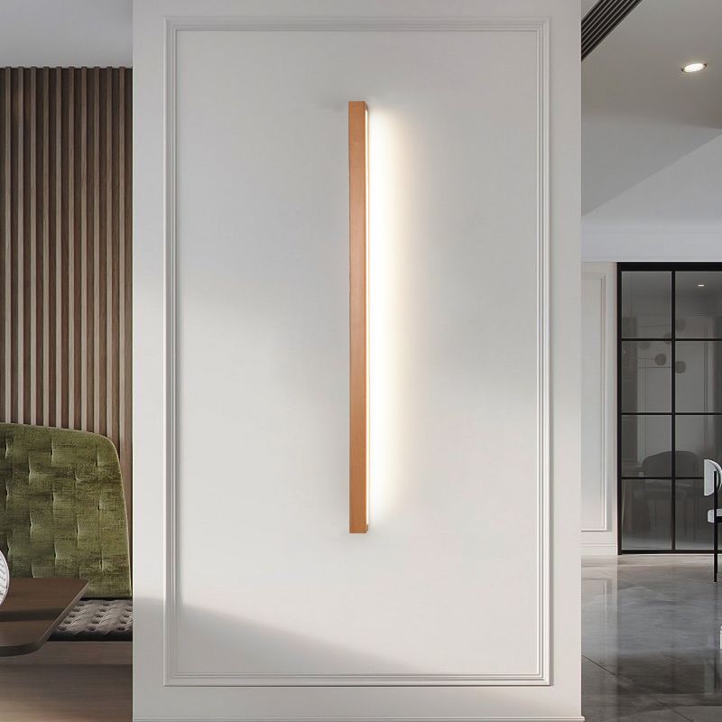 Muto wall lamp above vanity mirror