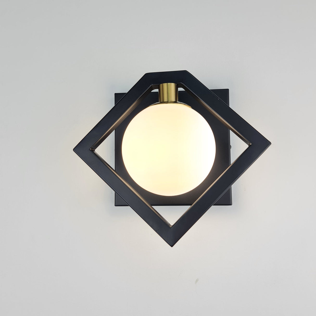 Marlow black gold wall light with white glass ball shade — GildNest UK