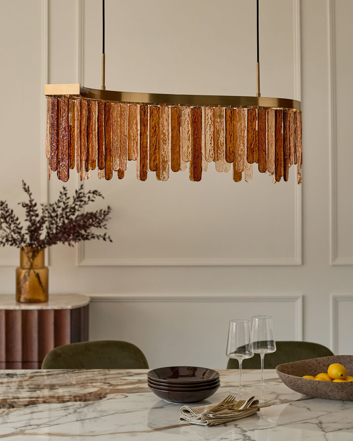 Mar Caramel Champagne Glass 9-Bulb Chandelier above dining table