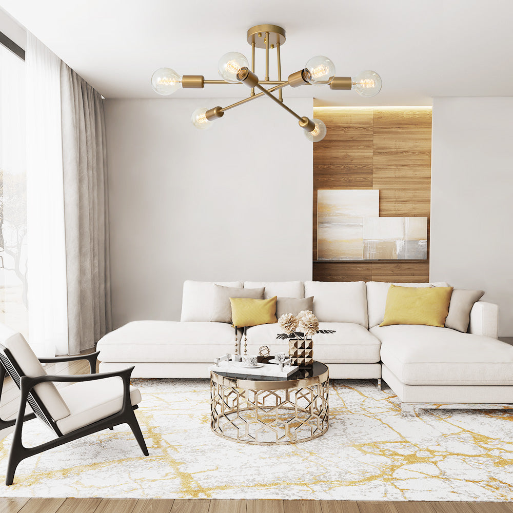 Vallin chandelier close-up brass arms — GildNest UK