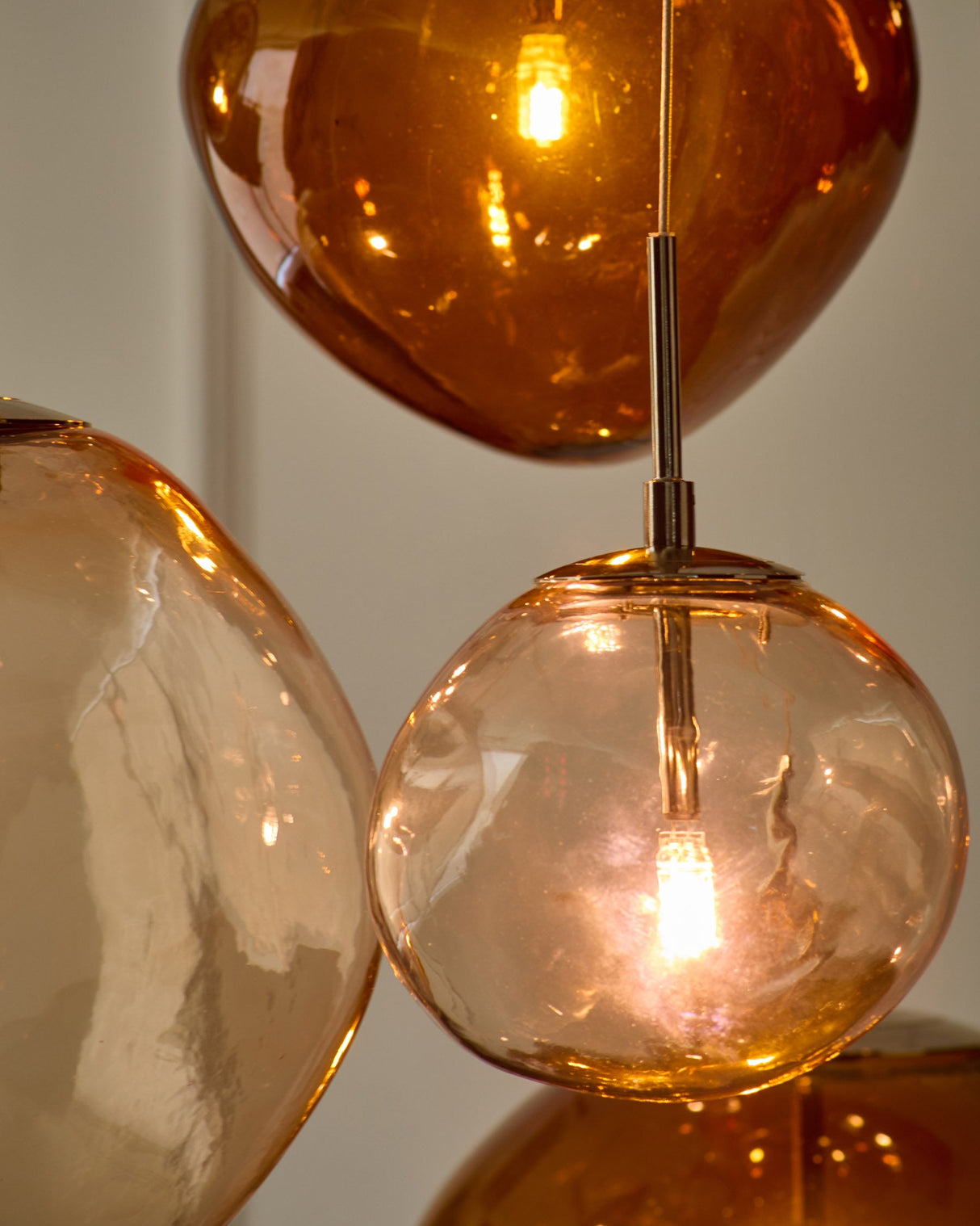 Orla 8-Bulb Mocha Caramel Glass Pendant Light studio shot