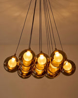 Riley Olive Green Glass Cluster Pendant Light lit in situ