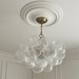 Bellina Glass Bubble Cluster Chandelier 3-Light Brass installed with ceiling medallion
